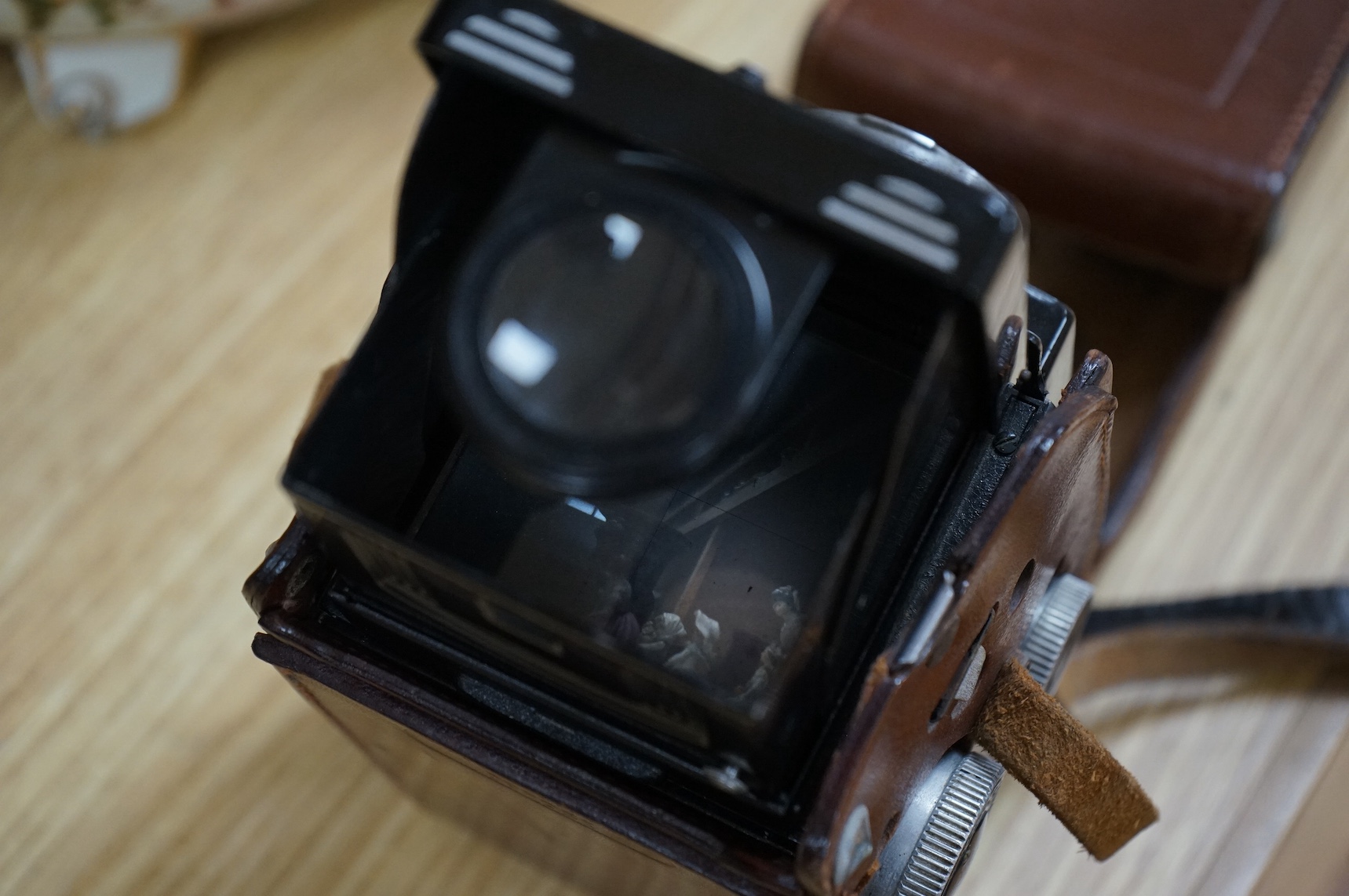 A vintage Rolleicord TLR camera, cased.
